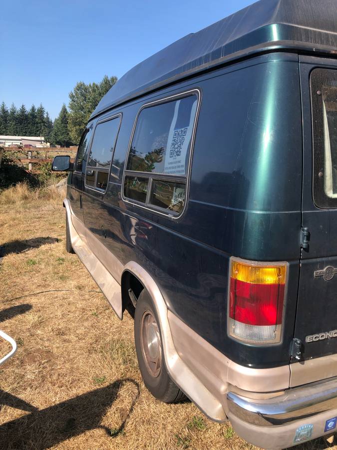 Ford-e150-conversion-van-1994-green