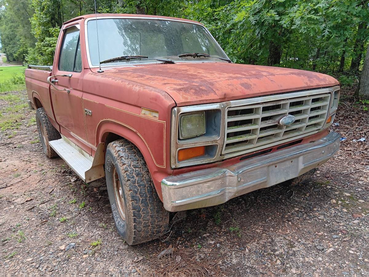 Ford-f150-4x4-1985-red-1
