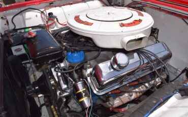 Ford-thunderbird-sunroof-coupe-1960-red-10