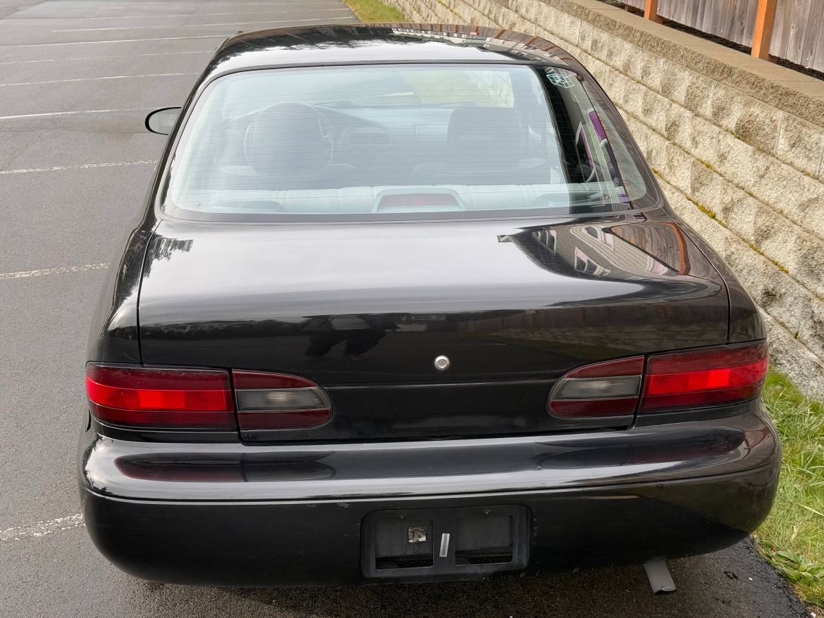 Geo-prizm-1994-black-1