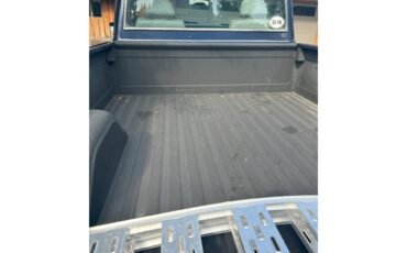 Gmc-12-ton-pickup-1971-dark-blue-gray-leather-3