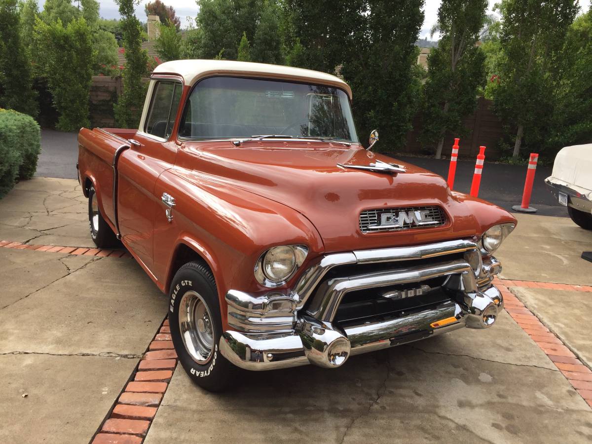 Gmc-suburban-carrier-1955-brown-2