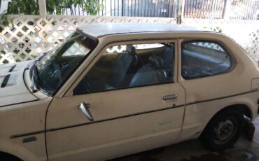 Honda-civic-hatchback-1976-yellow-13