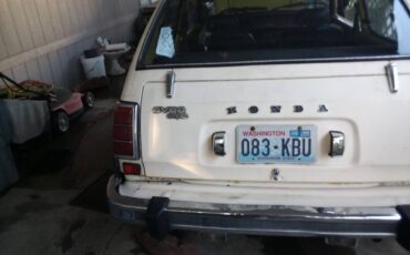 Honda-civic-hatchback-1976-yellow-16