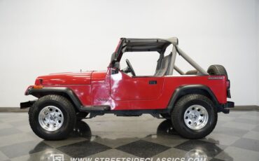 Jeep-Wrangler-1989-Bright-red-Tan