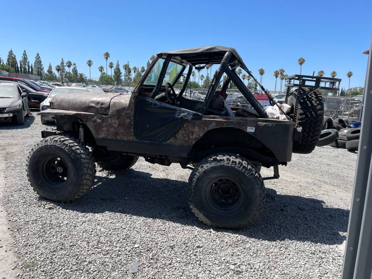 Jeep-cj-5-open-body-std.-1983-brown-1