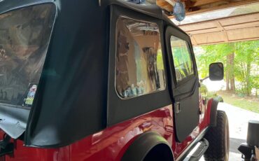 Jeep-cj-7-open-body-with-extra-duty-suspension-1983-red-13
