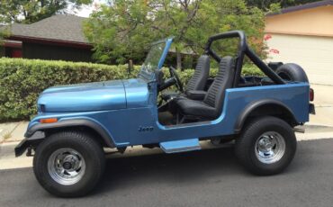 Jeep-cj-7-open-body-with-extra-duty-suspension-1986-blue-1