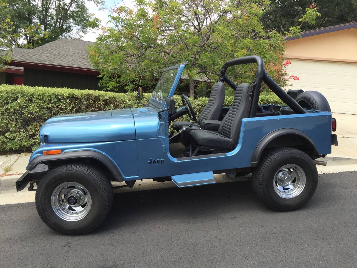Jeep-cj-7-open-body-with-extra-duty-suspension-1986-blue-1