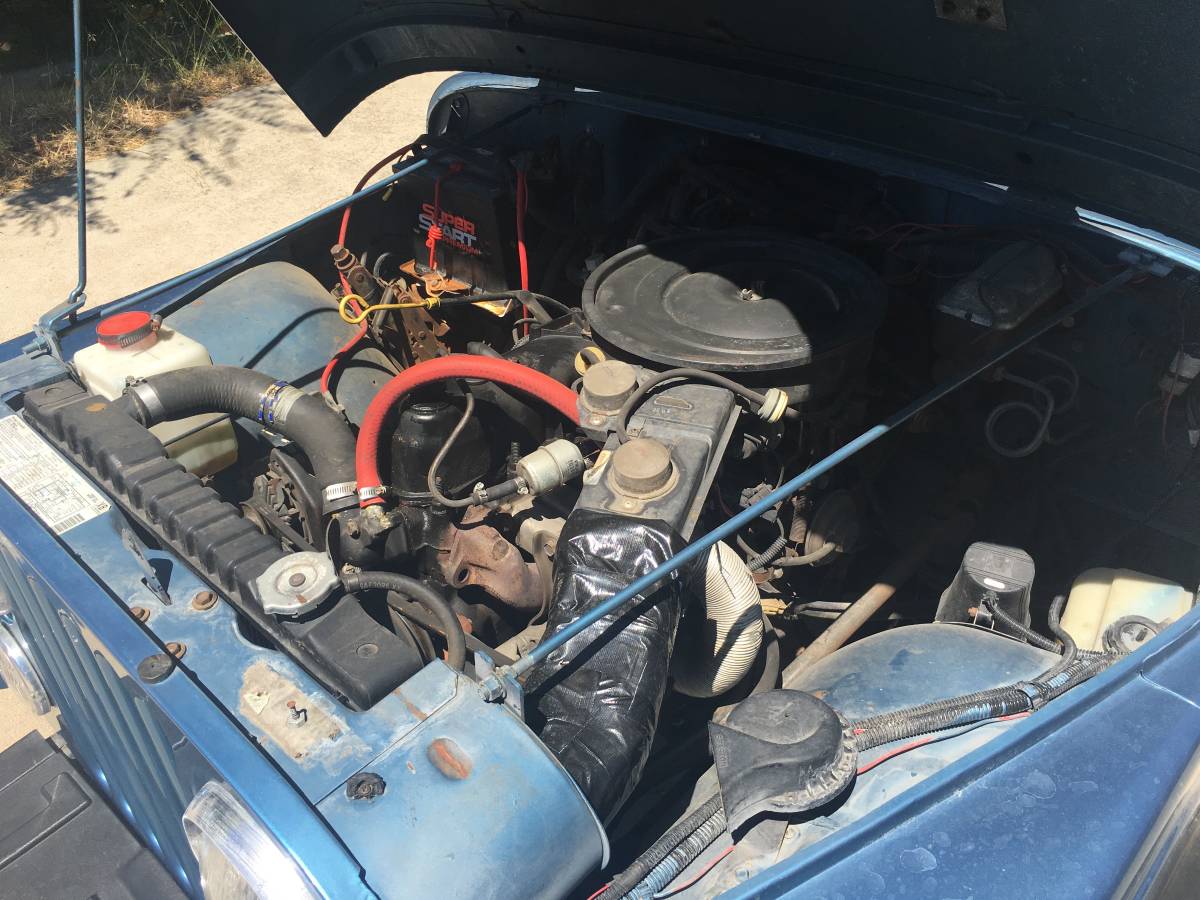 Jeep-cj-7-open-body-with-extra-duty-suspension-1986-blue-10