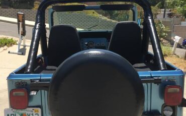 Jeep-cj-7-open-body-with-extra-duty-suspension-1986-blue-11