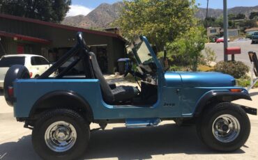 Jeep-cj-7-open-body-with-extra-duty-suspension-1986-blue