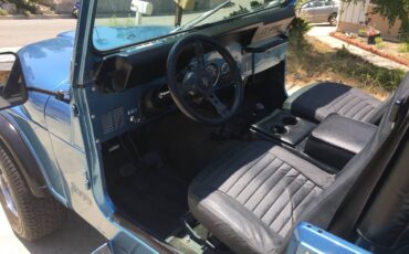 Jeep-cj-7-open-body-with-extra-duty-suspension-1986-blue-4