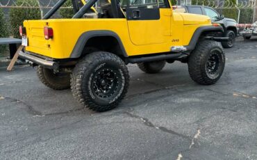 Jeep-wrangler-yj-1990-yellow-1