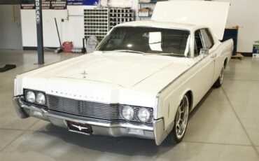 Lincoln-Continental-1966-White-Red-11
