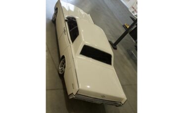 Lincoln-Continental-1966-White-Red-7