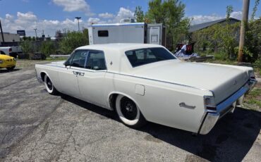 Lincoln-Continental-1969-White-Green-and-Gold-2