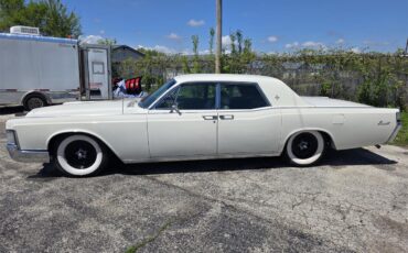 Lincoln-Continental-1969-White-Green-and-Gold-8