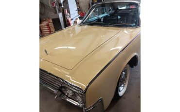 Lincoln-Continental-convertible-1961-Yellow-Black-10