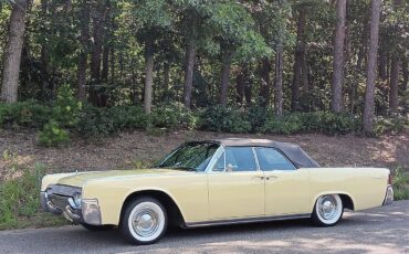 Lincoln-Continental-convertible-1961-Yellow-Black