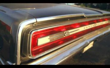 Lincoln-Continental-convertible-1966-BLACK-RED-1