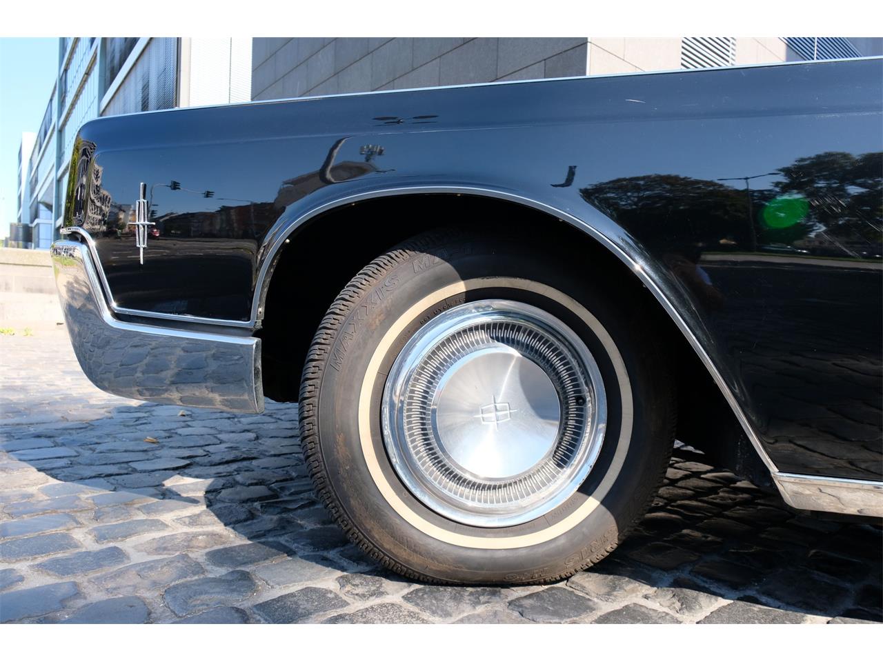 Lincoln-Continental-convertible-1966-BLACK-RED-10