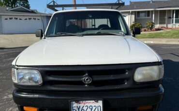 Mazda-3-1994-white-1