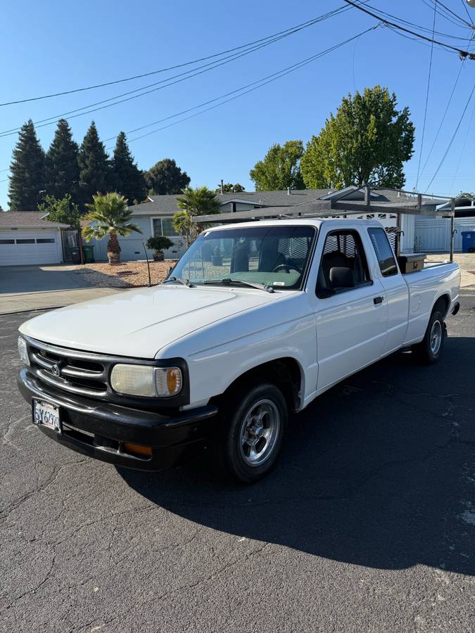 Mazda-3-1994-white-2