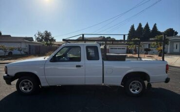 Mazda-3-1994-white-9