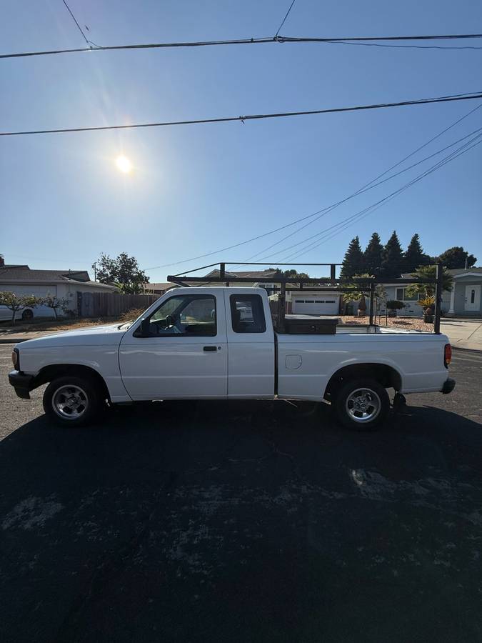 Mazda-3-1994-white-9