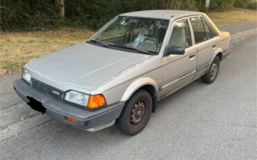 Mazda-323-1988-brown-1