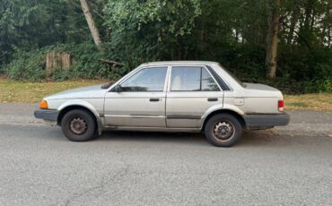 Mazda-323-1988-brown