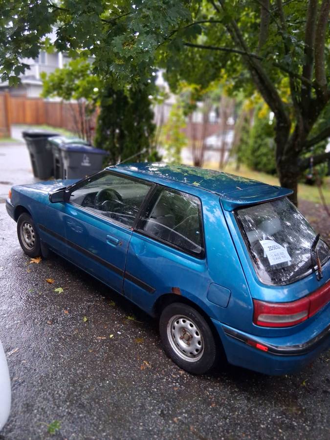 Mazda-323-1993-blue