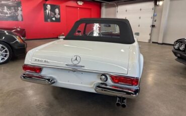 Mercedes-benz-230sl-1966-WhiteBlack-Top-Red-17