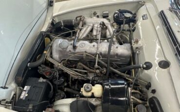 Mercedes-benz-230sl-1966-WhiteBlack-Top-Red-32
