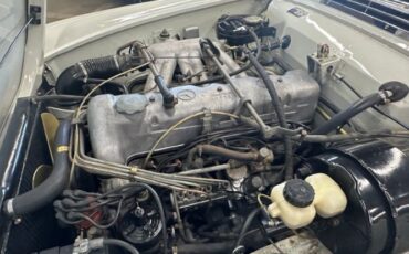 Mercedes-benz-230sl-1966-WhiteBlack-Top-Red-34