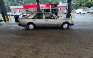 Mercedes-benz-300e-1990-brown-1
