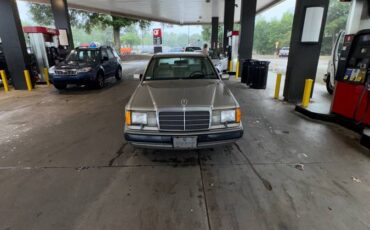 Mercedes-benz-300e-1990-brown-2