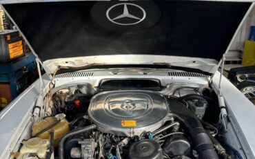 Mercedes-benz-560-sl-r107-1987-white-12