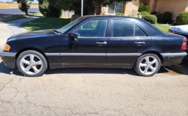 Mercedes-c280-1990-black
