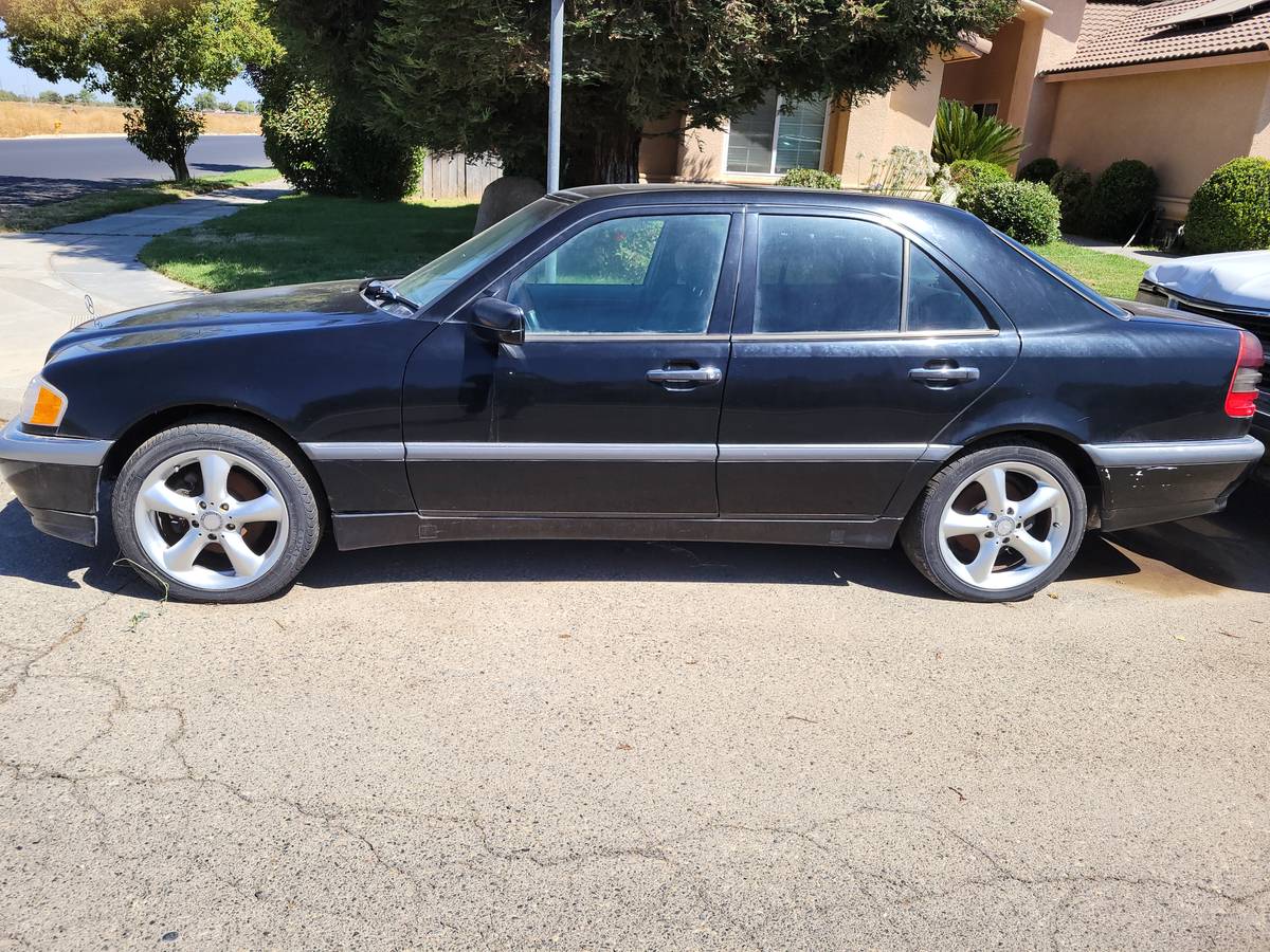 Mercedes-c280-1990-black