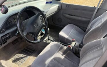 Mercury-tracer-1994-red-1