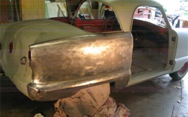 Nash-Metropolitan-1958-redWhite-BlackWhite-48