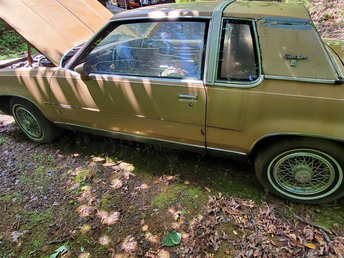 Oldmobile-cutlass-supreme-1987-brown-14