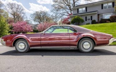 Oldmobile-toronado-1967-red-1