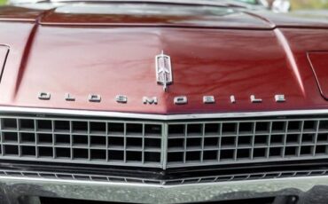 Oldmobile-toronado-1967-red-10