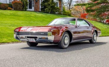 Oldmobile-toronado-1967-red