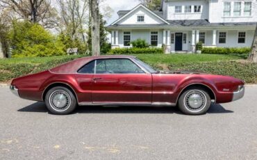 Oldmobile-toronado-1967-red-8