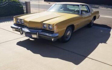 Olds-toronado-1973-yellow-2