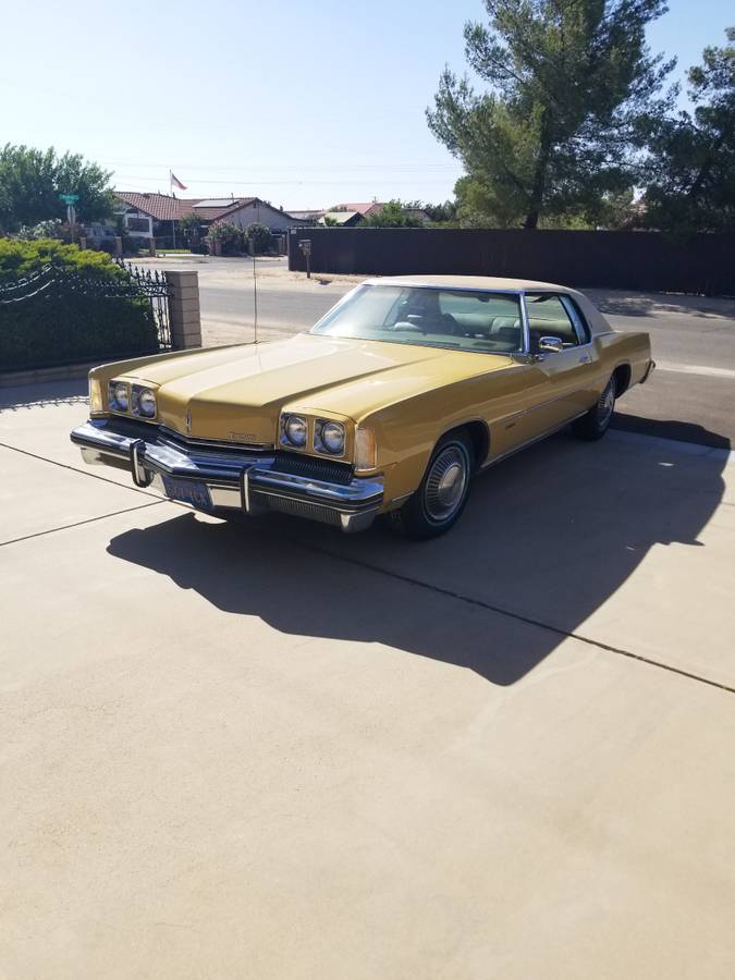 Olds-toronado-1973-yellow-2